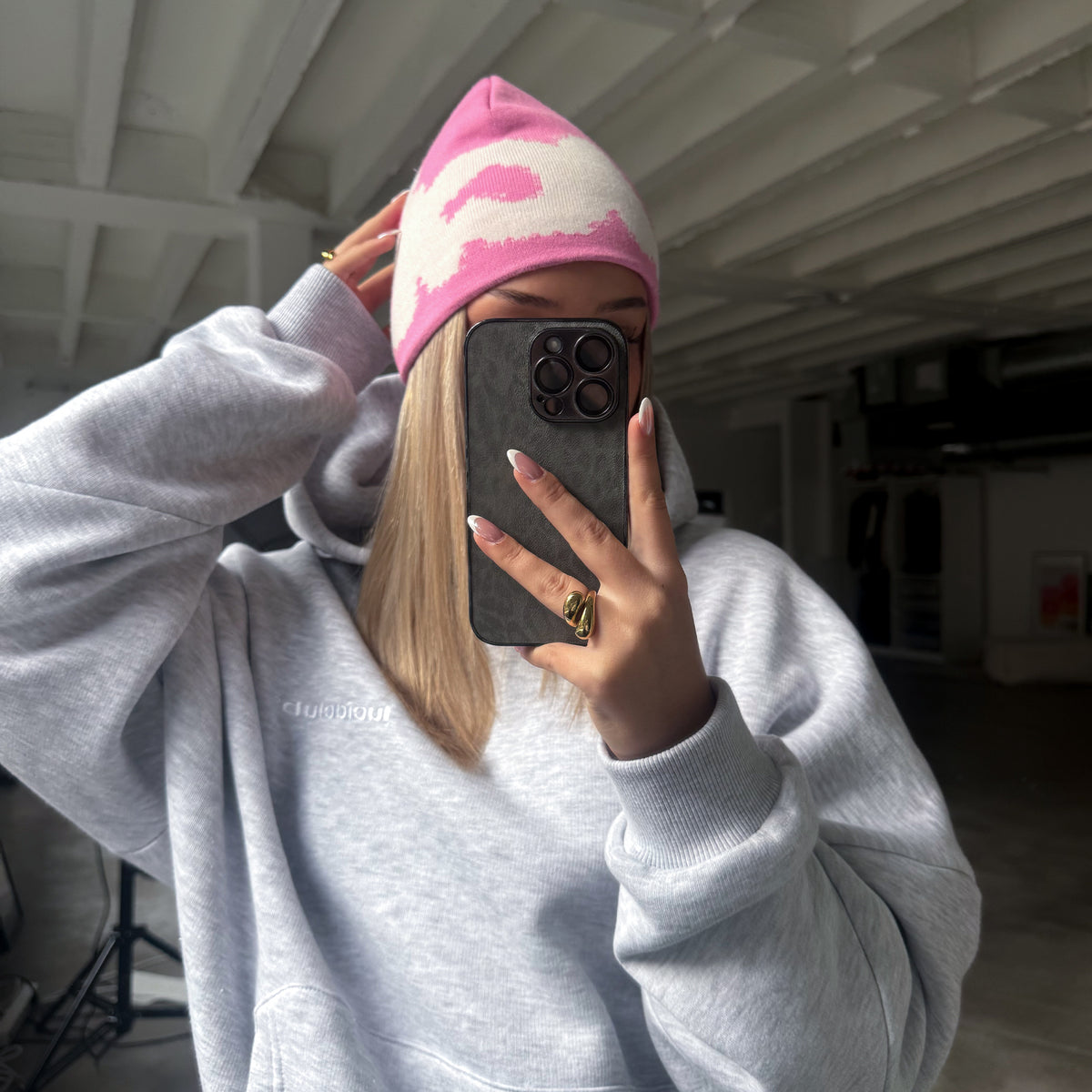 Lucid! Beanie Hyper Pink on female model, mirror selfie