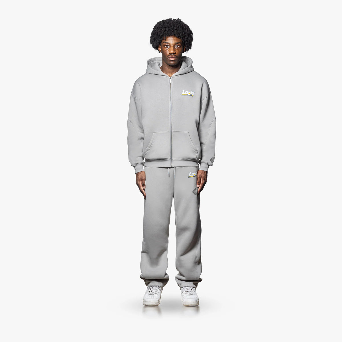 LOA Zip-Hoodie Grey on model, front view with grey sweatpants