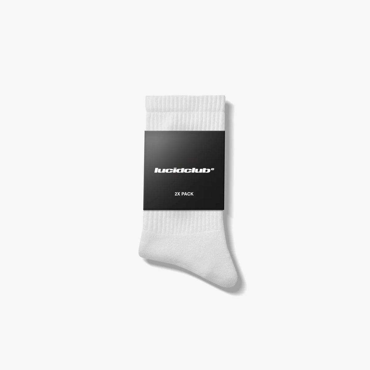 Lucid Club socks in white in the packaging