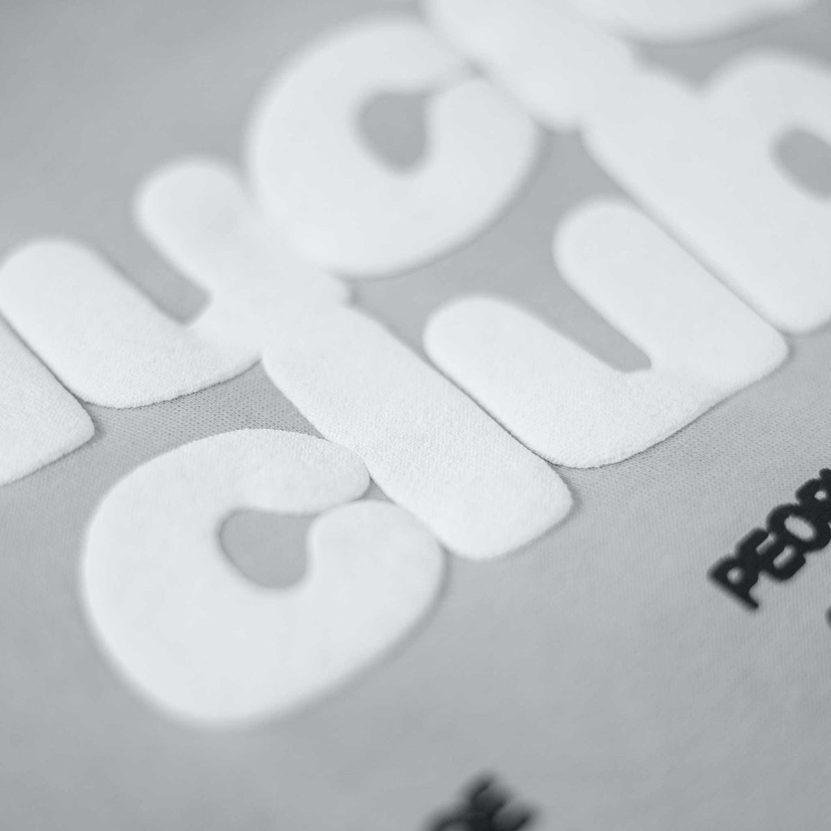 LOA Zip-Hoodie Grey, close up of the Lucid Club print