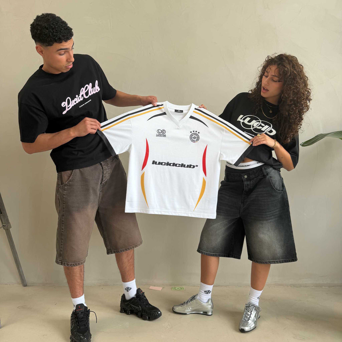 Germany Jersey held up by two models