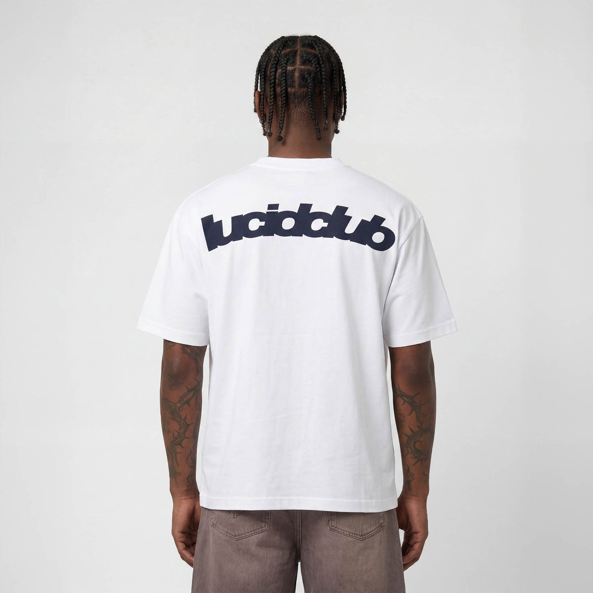 Signature T-Shirt White on model, back view with back print